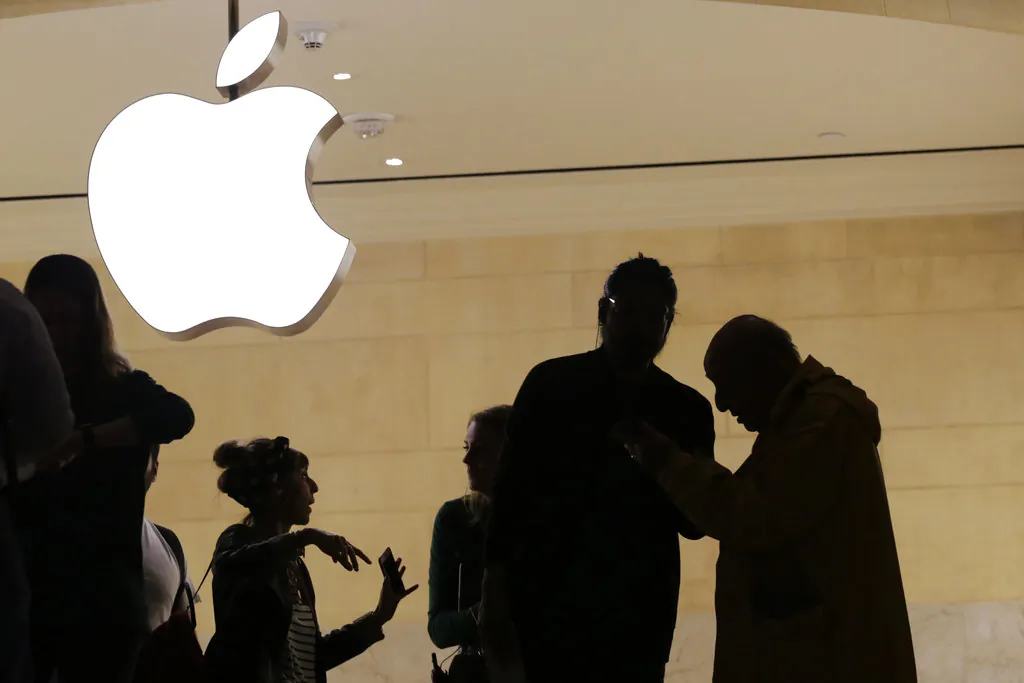 Apple is expected to unveil its biggest and most expensive iPhone yet on  Sept. 12, along with two smaller, cheaper versions in an attempt to widen the product’s appeal amid slowing sales growth. (Mark Lennihan/AP)