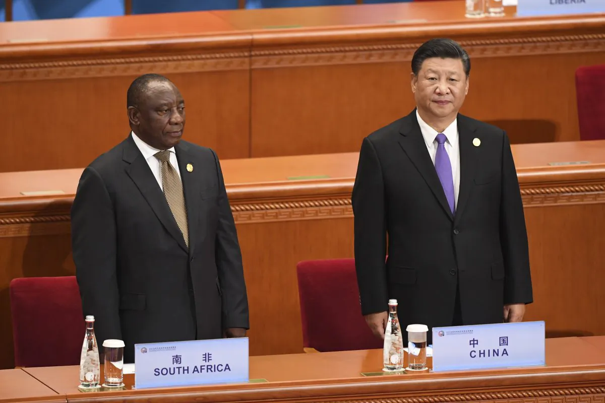 Chinese leader Xi Jinping, right, and South Africa's President Cyril Ramaphosa await other participants to arrive before the start of the opening ceremony of the Forum on China-Africa Cooperation at the Great Hall of the People on September 3, 2018 in Beijing, China. (Madoka Ikegami - Pool/Getty Images)