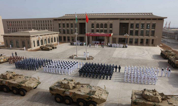 Chinese military personnel attending the opening ceremony of China's new military base in Djibouti on Aug. 1, 2017. (STR/AFP/Getty Images)