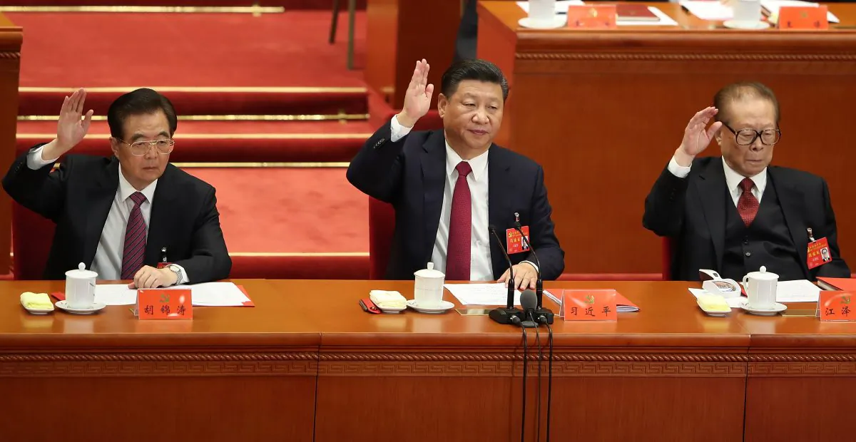 (L-R) The Chinese Communist Party’s three most recent general secretaries: Hu Jintao (2002-2012), Chinese Xi Jinping (current) and Jiang Zemin (1989-2002) at the closing of the 19th Communist Party Congress in the Great Hall of the People in Beijing, China, on Oct. 24, 2017. (Lintao Zhang/Getty Images)
