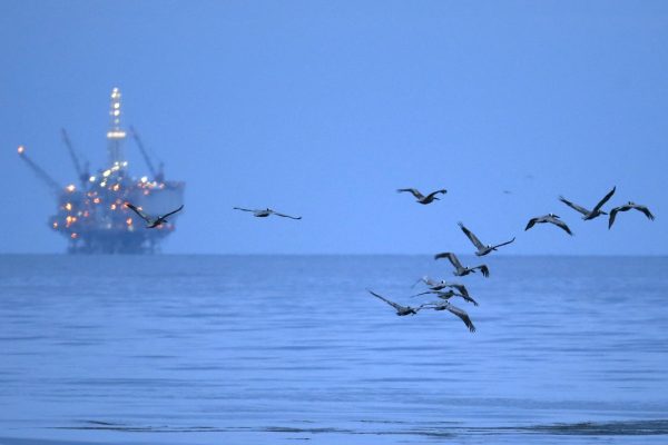 an oil-drilling platform above an oil slick along the coast of Refugio State Beach in Goleta, Calif.