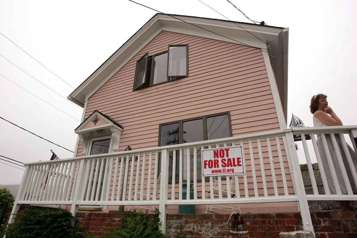Susette Kelo stands outside her home, in the Fort Trumbull area of New London, Connecticut in this file photo. The U.S. Supreme Court ruled in 2005 that the stimulation of economic development is a suitable use of the government's power to seize private property. However, it's private property that's fundamental to every human right and liberty. (Spencer Platt/Getty Images)