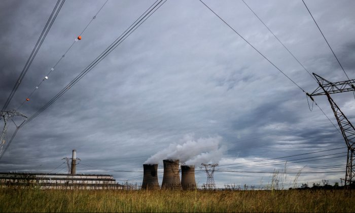 The towers of an Eskom power plant in the Hendrina settlement, South Africa, on Feb. 22, 2018. (Marco Longari/AFP/Getty Images)