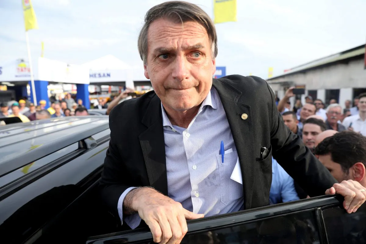 Presidential candidate Jair Bolsonaro leaves an agribusiness fair in Esteio, Rio Grande do Sul state, Brazil on Aug. 29, 2018. (Diego Vara/Reuters)