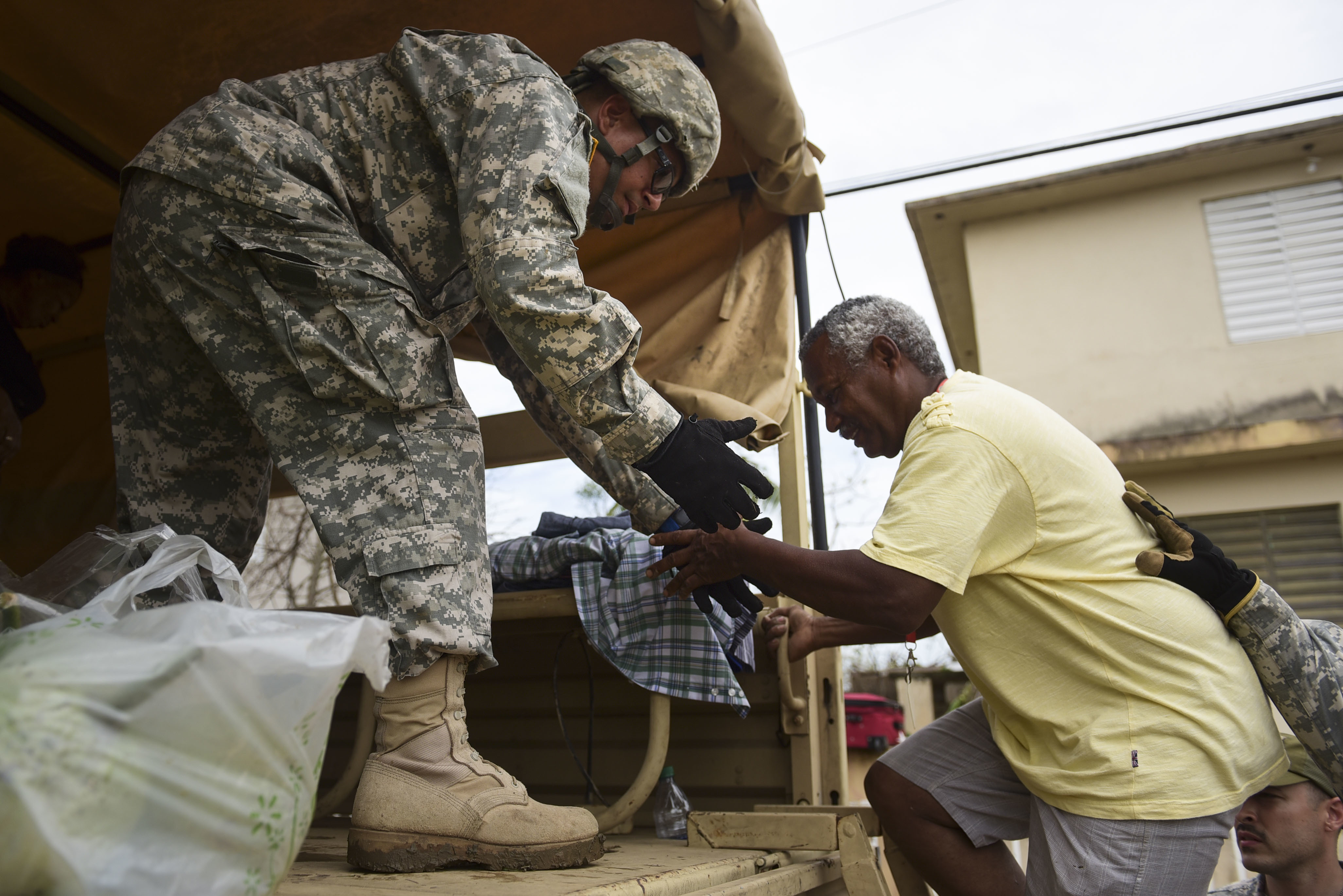 National Guard personnel evacuate Maria victims