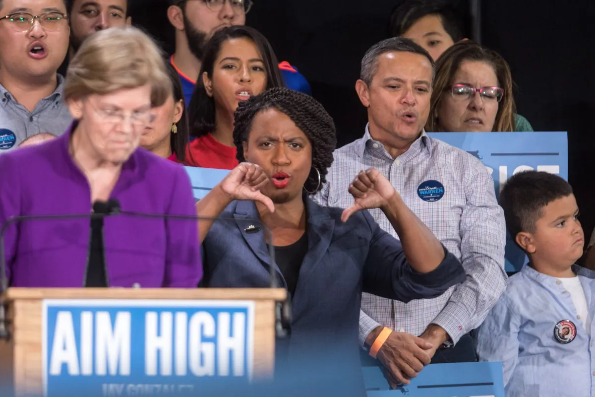 Boston City Council member Ayanna Pressley (R) gestures at a rally attended by U.S. Sen. Elizabeth Warren (D-MA) and Democratic gubernatorial candidate Jay Gonzalez on Sept. 9, 2018, in Cambridge, Massachusetts. (Scott Eisen/Getty Images)