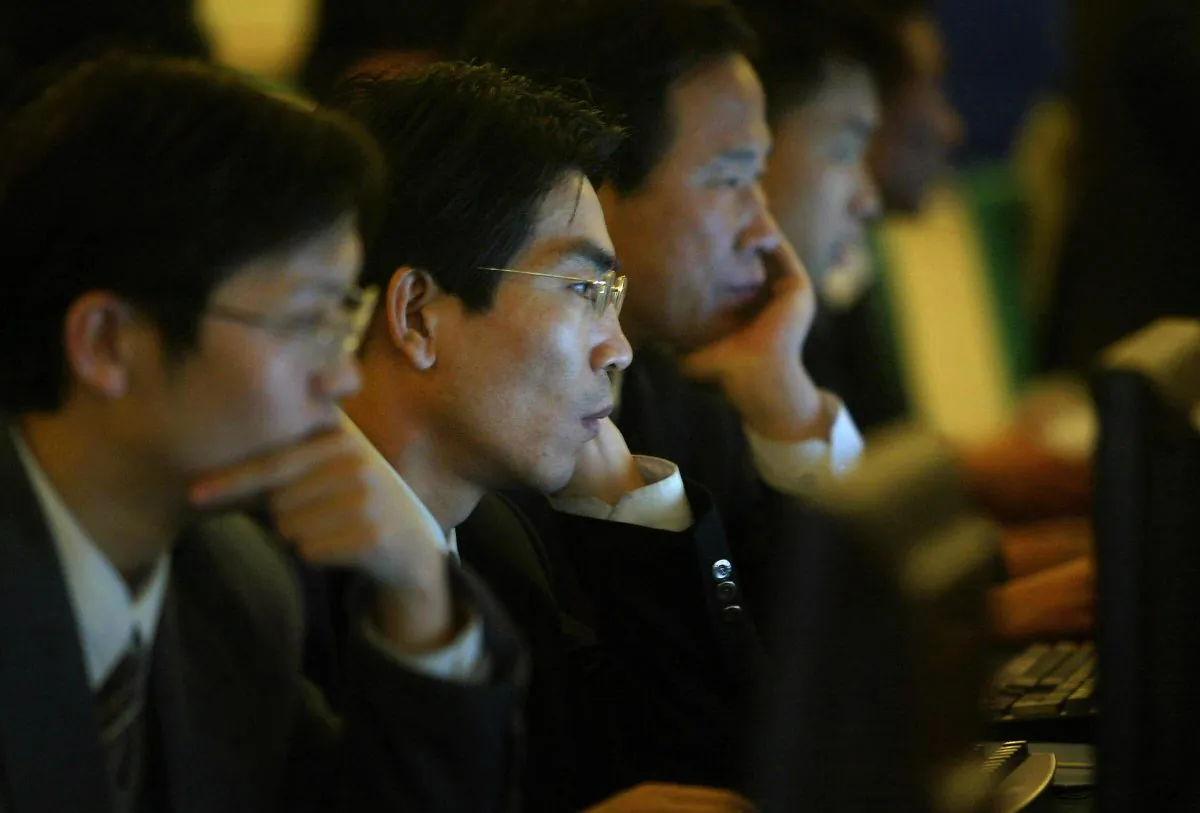 National People's Congress delegates surf the internet in Beijing, China on March 14, 2004. (FREDERIC J. BROWN/AFP/Getty Images)