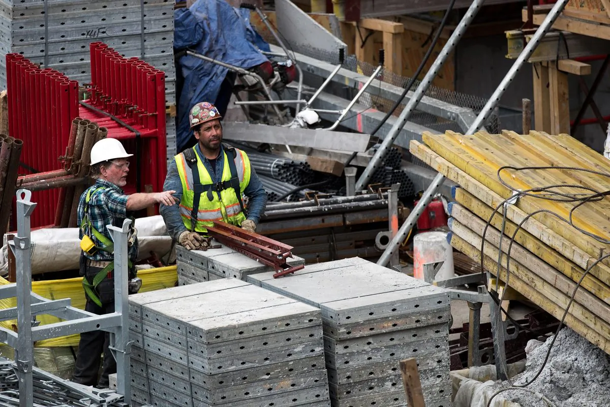 Construction laborers on the site of a new residential building in the Hudson Yards development in New York City on Aug. 16, 2016. (Drew Angerer/Getty Images)