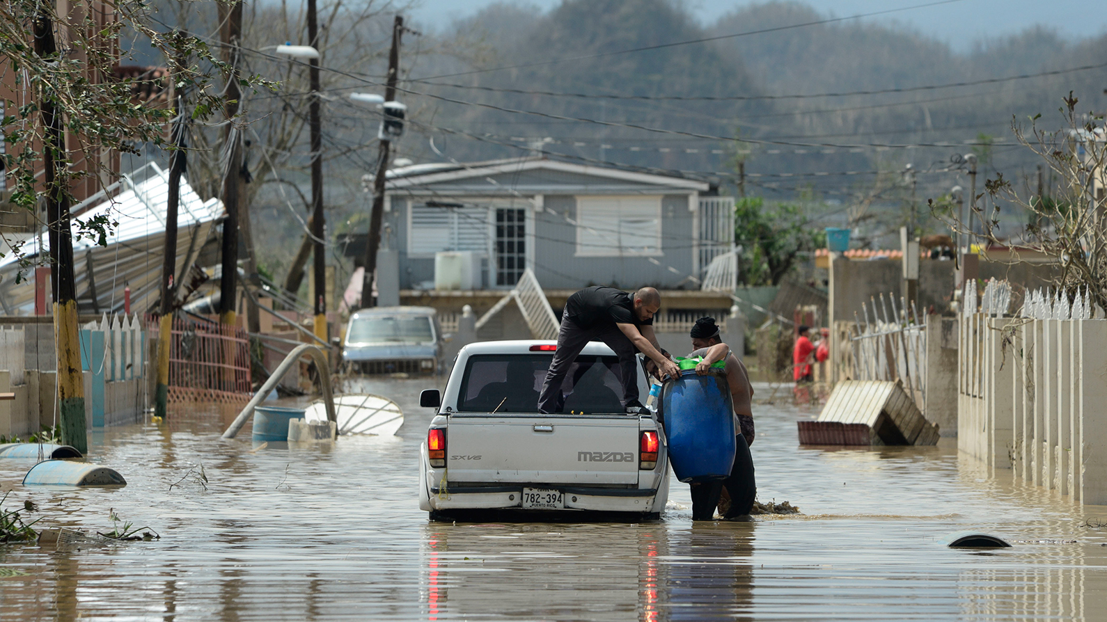 Millions of Bottles of Water Never Got to Maria Victims