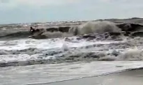 Video: Surfers Hit Hurricane Florence Storm Surge in South Carolina