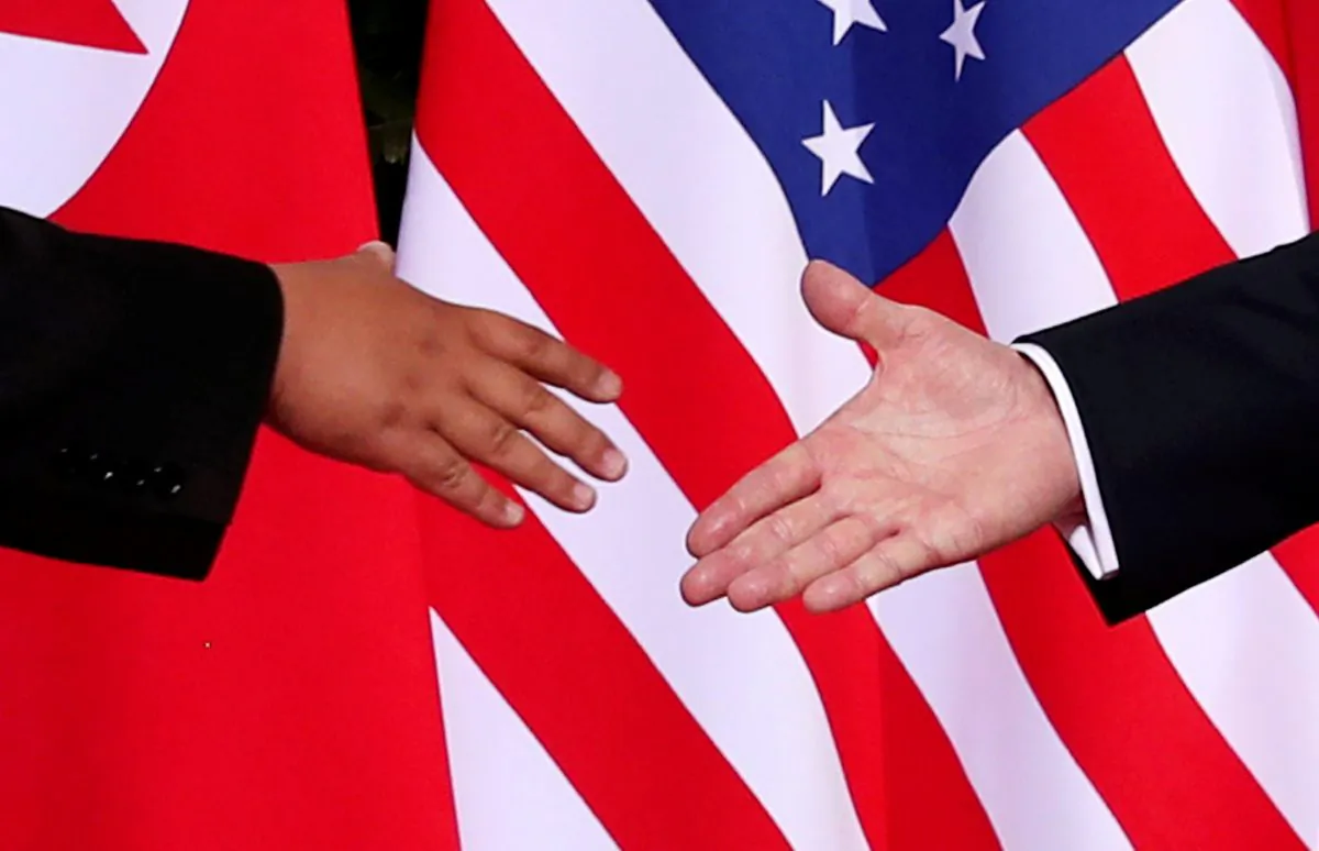 President Donald Trump shakes hands with North Korean leader Kim Jong-Un at the Capella Hotel on Sentosa island in Singapore, on June 12, 2018. (Jonathan Ernst/Reuters)