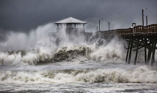 Waves slam against a pier in North Carolina