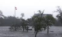 The Latest: Hurricane Florence Now Hovering Near Cape Fear