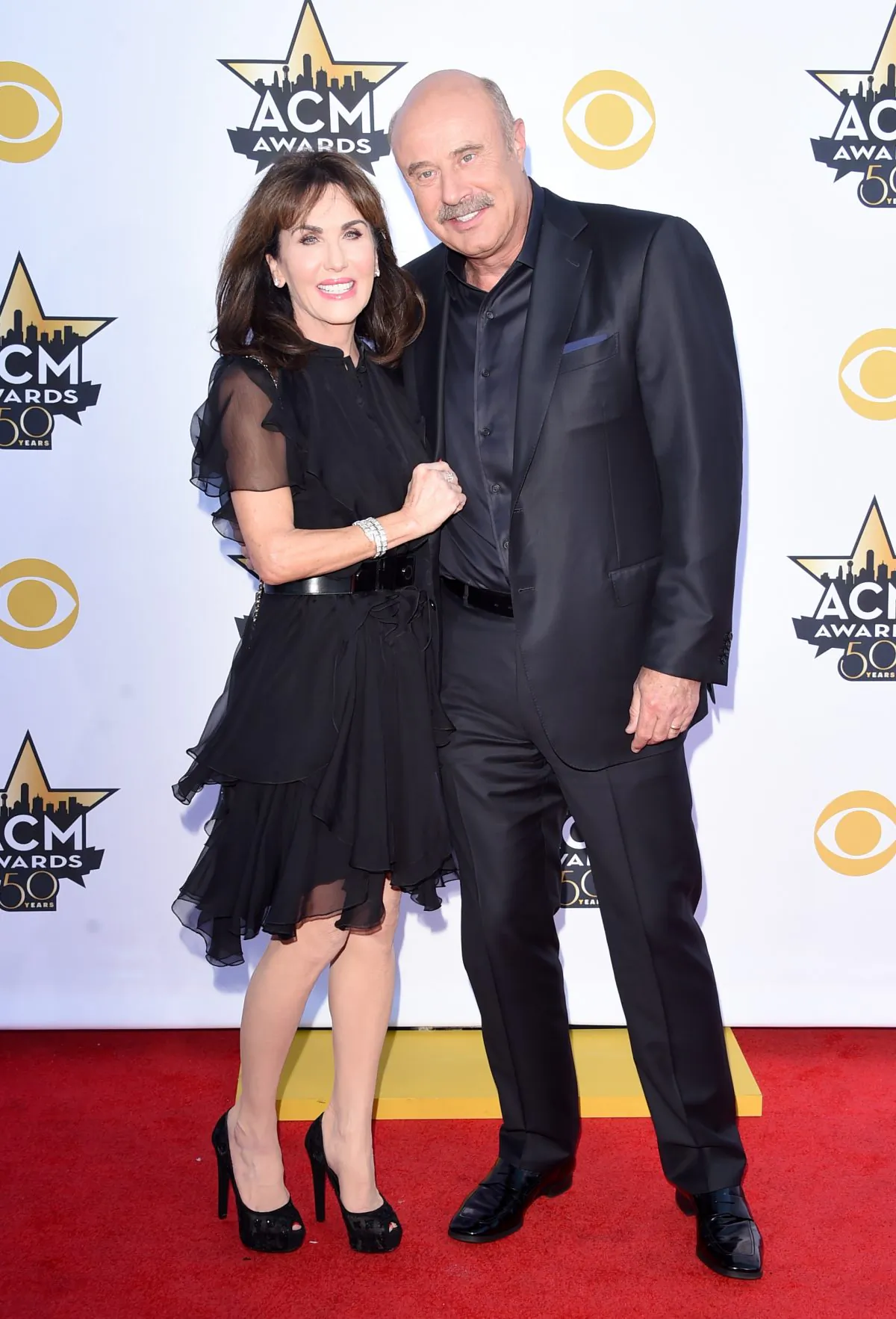 Dr. Phil and Robin attend the 50th Academy of Country Music Awards at AT&T Stadium in Arlington, Texas on April 19, 2015. (Jason Merritt/Getty Images)