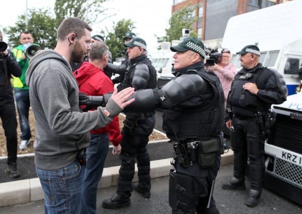 Riot police stop a Republicanparade