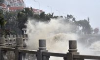 The Latest: 2 Dead After Typhoon Slams Into Southern China