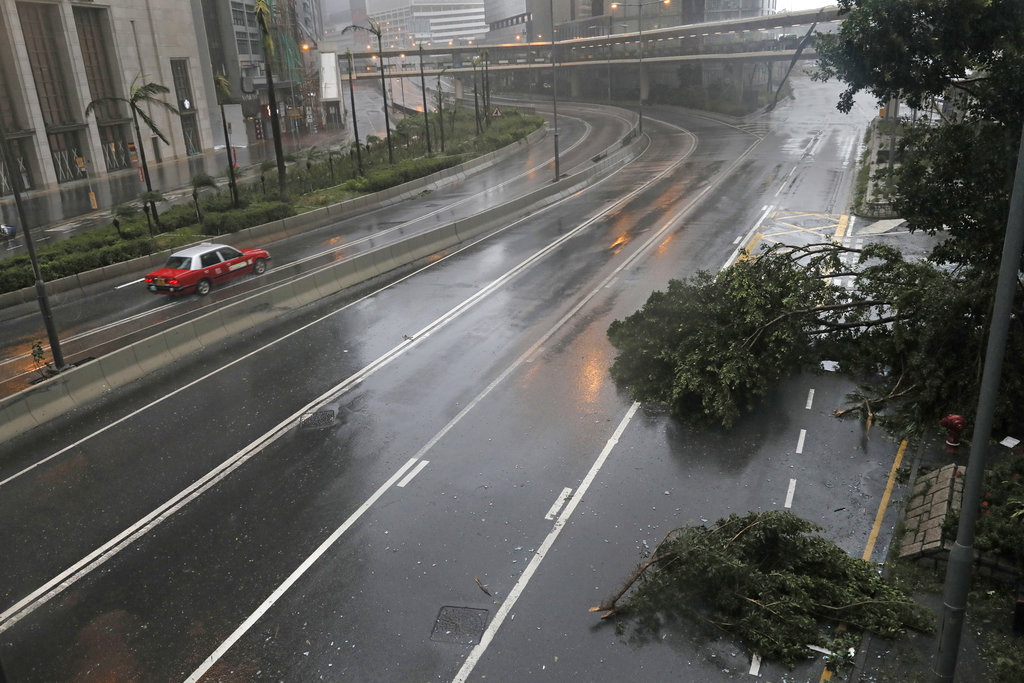 Super Typhoon Wrecks Buildings, Trees in Hong Kong