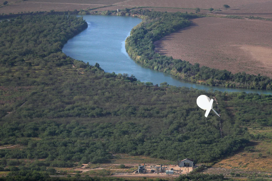 A U.S. Border Patrol Aerostat hot-air surveillance balloon flies near the Rio Grande at the U.S.–Mexico border in La Joya, Texas, on Aug. 18, 2016. (John Moore/Getty Images)