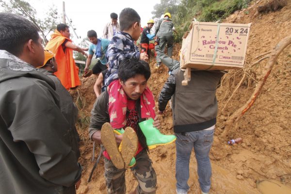 People evacuate following landslides caused by Typhoon Mangkhut