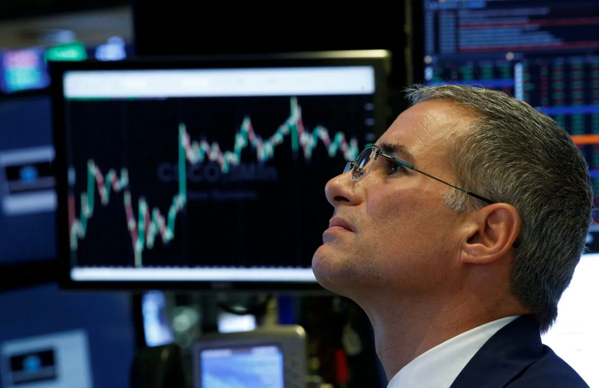 Traders work on the floor of the New York Stock Exchange (NYSE) in New York, U.S. on September 18, 2018. (Brendan McDermid/Reuters)