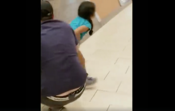 Man and toddler vending machine game