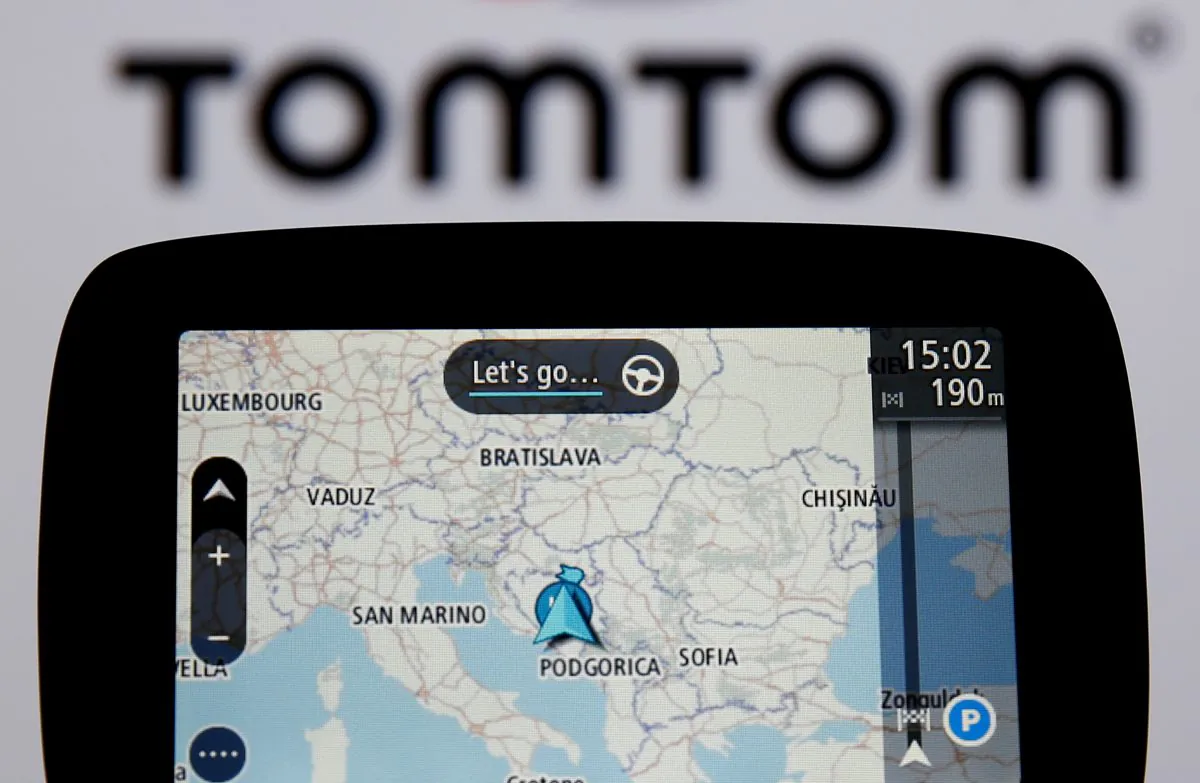 TomTom navigation are seen in front of TomTom displayed logo in this illustration taken July 28, 2017. (Dado Ruvic/Reuters)