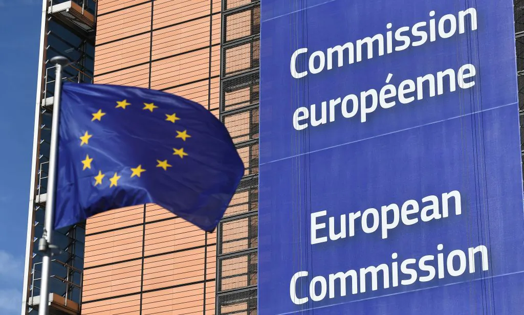A European Union flag next to the European Commission headquarters in Brussels on March 14, 2018. (Emmanuel Dunand/AFP/Getty Images)