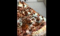 Video: Woman Shows Alleged Maggots on Slice of Pizza