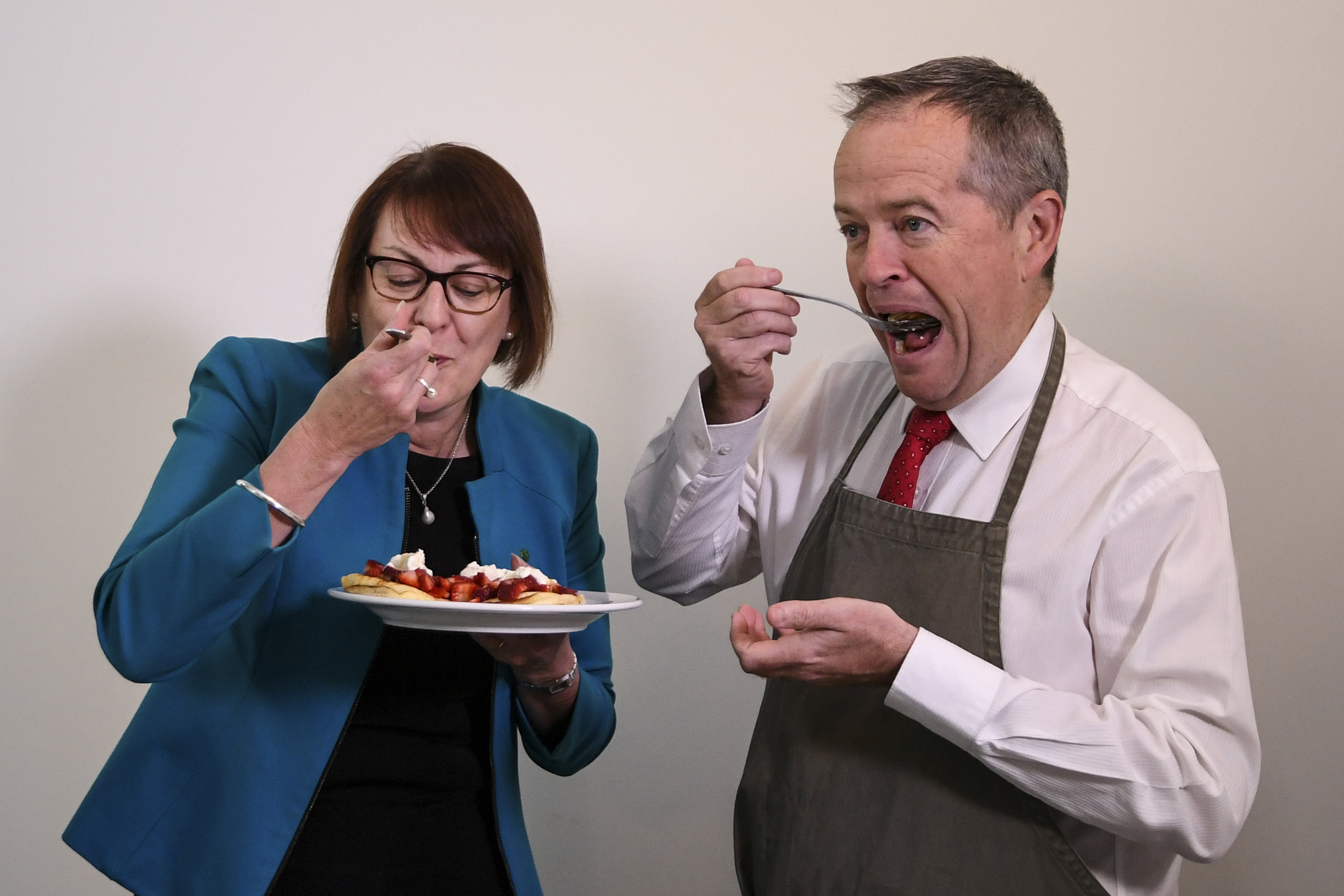 Australian Opposition Leader Bill Shorten and Labor MP Susan Templeman eat strawberry pancakes in Canberra