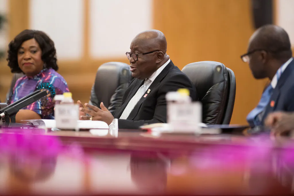Ghana's President Nana Akufo-Addo (C) speaks to Chinese leader Xi Jinping (not pictured) during their meeting at the Great Hall of the People in Beijing on Sept. 1, 2018. (Nicolas Asfouri/AFP/Getty Images)