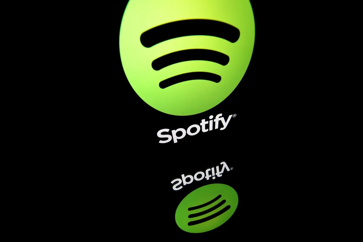 An illustration picture shows the logo of online streaming music service Spotify displayed on a tablet screen in Paris in April 19, 2018. (LIONEL BONAVENTURE/AFP/Getty Images)