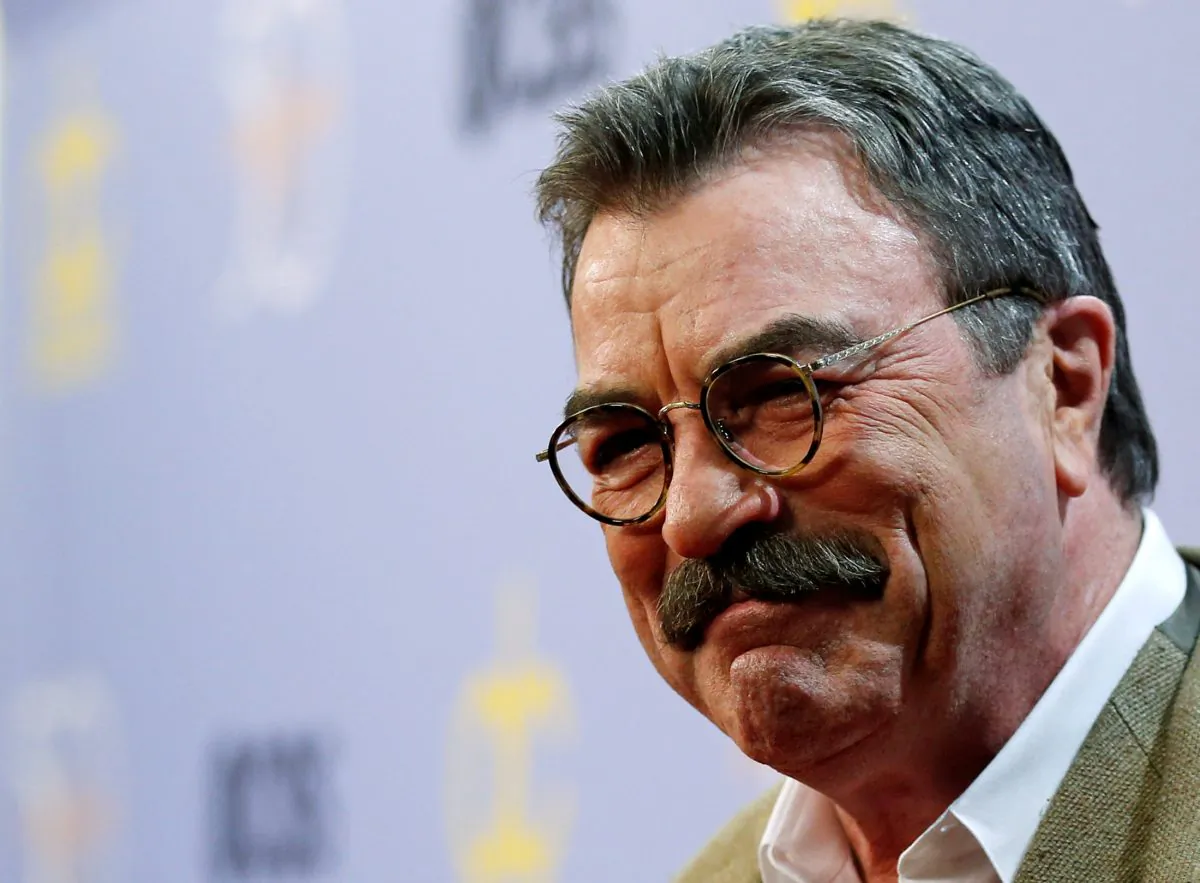 Actor Tom Selleck poses as after arriving for the taping of "The Carol Burnett 50th Anniversary Special" at CBS Studios in Los Angeles, Oct. 4, 2017. (REUTERS/Mario Anzuoni)