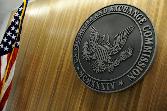 The seal of the U.S. Securities and Exchange Commission hangs on the wall at SEC headquarters in Washington, on June 24, 2011.   (Reuters/Jonathan Ernst)