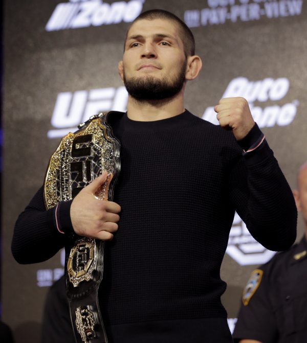 Nurmagomedov poses with his belt