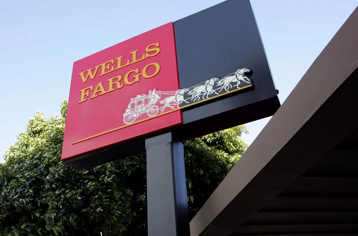 The Wells Fargo logo is seen on a sign outside of a Wells Fargo Home Mortgage branch office in San Francisco, Calif., on March 20, 2007. (Justin Sullivan/Getty Images)