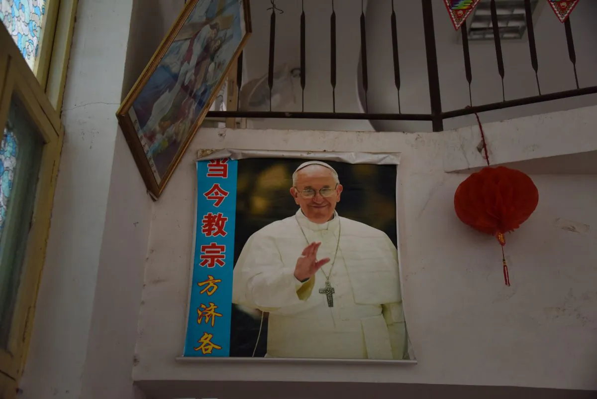 A poster of the Pope is seen in a closed church in Xincun, in China's central Henan Province on Aug. 12, 2018.  (Greg Baker/AFP/Getty Images)