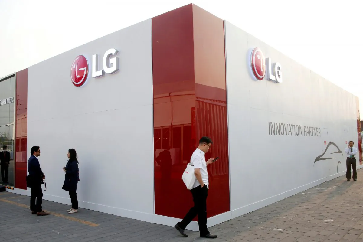 Visitors walk past the showroom of LG Electronics during the Auto China 2016 show in Beijing on April 26, 2016. (REUTERS/Kim Kyung-Hoon/File Photo/File Photo)
