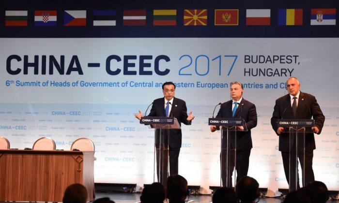 (L-R) Chinese Premier Li Keqiang, Hungarian Prime Minister Viktor Orban, and Bulgarian Premier Boyko Borisov speak during an economic forum in Budapest attended by 16 central and eastern European leaders on Nov. 27, 2017. (Attila Kisbenedek/AFP/Getty Images)