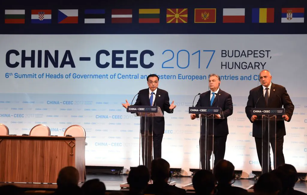 (L-R) Chinese Premier Li Keqiang, Hungarian Prime Minister Viktor Orban, and Bulgarian Premier Boyko Borisov speak during an economic forum in Budapest attended by 16 central and eastern European leaders on Nov. 27, 2017. (Attila Kisbenedek/AFP/Getty Images)