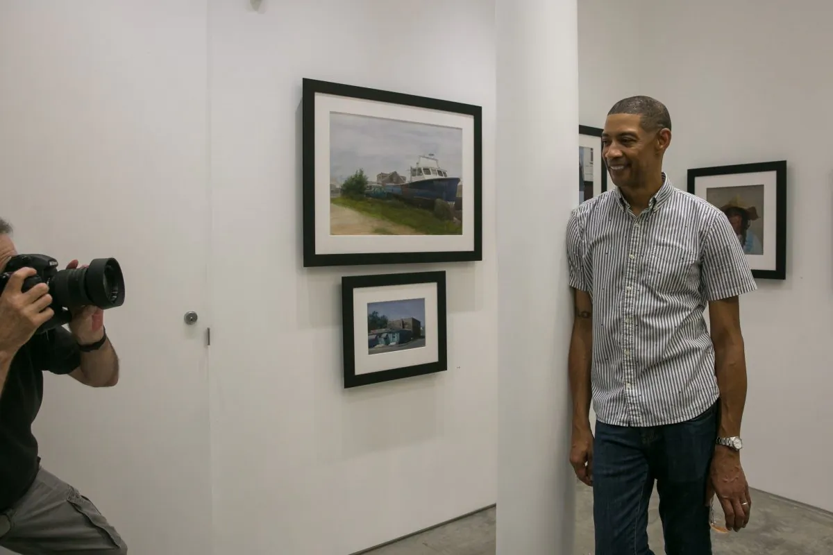 Mario A. Robinson celebrates at the opening of the exhibition of his paintings at the Bernarducci Gallery in the Chelsea district of New York, on Sept. 6, 2018. (Milene Fernandez/The Epoch Times)