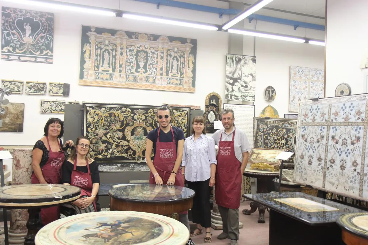 The Bianco Bianchi workshop in Pontassieve, Italy on July 11, 2018. (L) Sylvia Berlincioni, Elisabetta Bianchi, Leonardo Bianchi, Paola Lupelli Bianchi and  Alessandro Bianchi surrounded by historic pieces of scagliola. (Lorraine Ferrier/The Epoch Times)