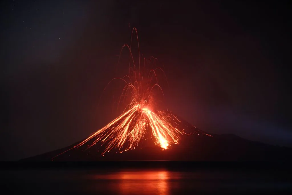 An Indonesian volcano called Anak Krakatau, known as the 'child' of the legendary Krakatoa, erupted on July 19, 2018, spewing a plume of ash high into the sky as molten lava streamed down from its summit. The ‘Child of Krakatoa’ erupted at least 44 times in the past week. (Ferdi Awed/AFP/Getty Images)
