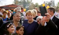 German Chancellor Merkel Takes Gamble With New Immigration Law