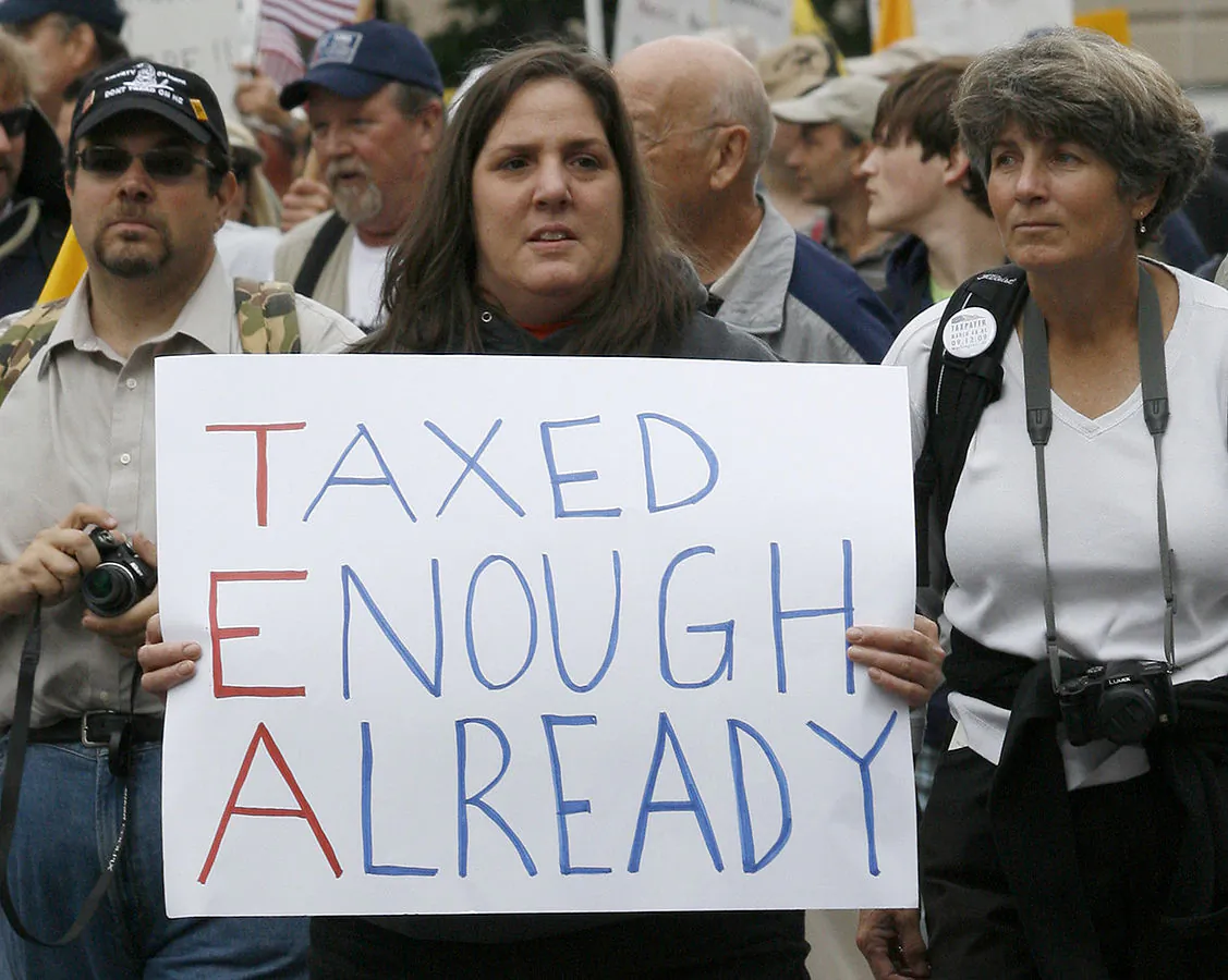 A woman holding a tea party sign at a taxpayer march in Washington on Sept. 16, 2009. (Creative Commons)