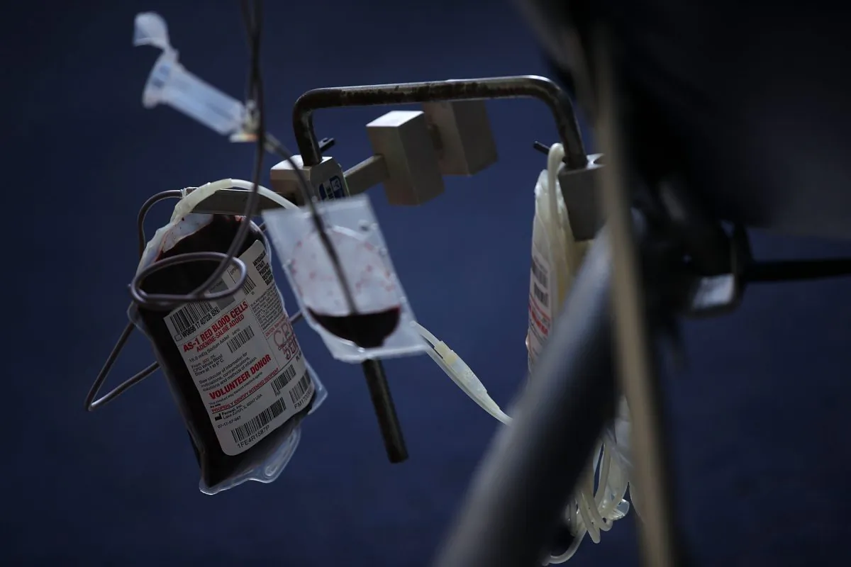 Blood is collected from a donor into a bag during a blood drive on Capitol Hill in Washington, on June 20, 2017. (Alex Wong/Getty Images)