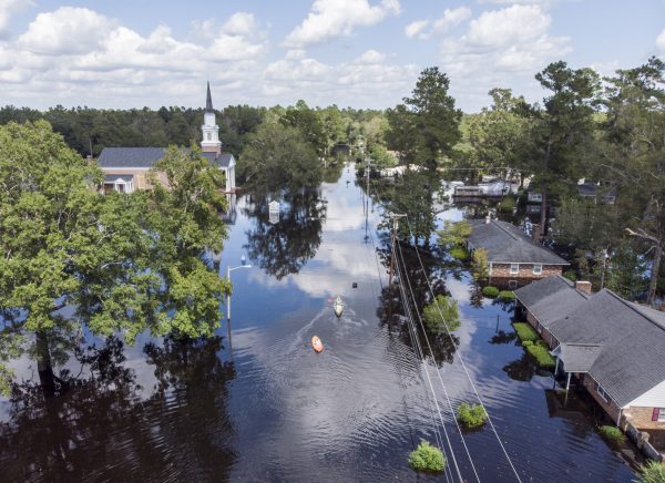Kayaks on a flooded road in South Carolina