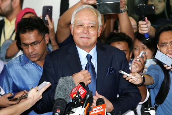 Malaysia's former Prime Minister Najib Razak leaves a court
