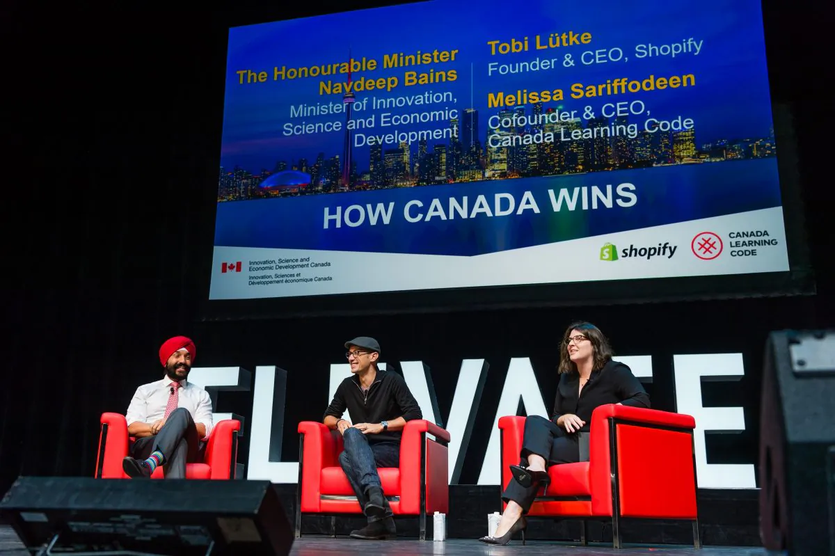 Innovation Minister Navdeep Bains, Shopify’s founder and CEO Tobi Lütke, and, Cofounder and CEO of Canada Learning Code Melissa Sariffodeen open Elevate, Canada’s innovation and tech festival at Sony Centre in Toronto on Sept. 25. (Photagonist.ca)
