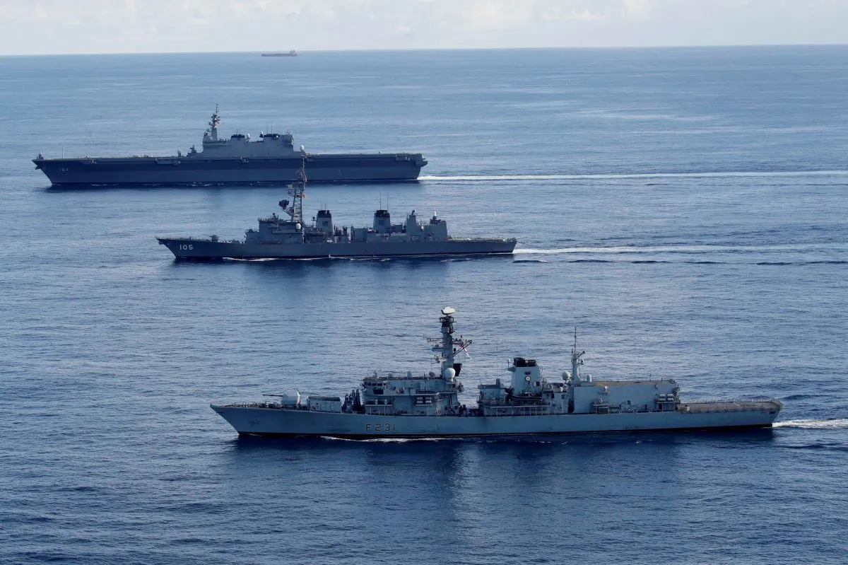 British frigate HMS Argyll (front), Japanese destroyer Inazuma (C) and Japanese helicopter carrier Kaga take part in a joint naval drill in the Indian Ocean on Sept. 26, 2018. (Kim Kyung-Hoon/Reuters)