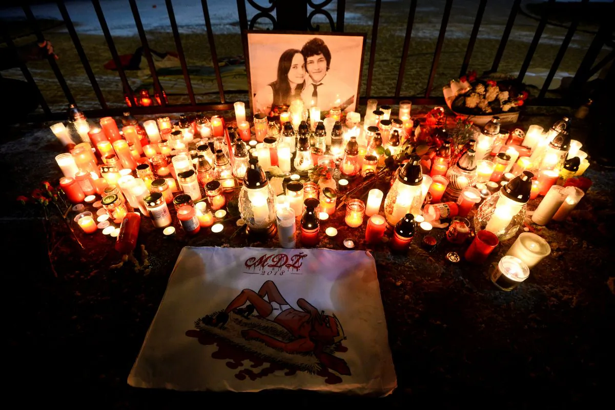 Candles are seen in front of the Government of the Slovak Republic's building during march in honour of murdered Slovak investigative reporter Jan Kuciak and his girlfriend Martina Kusnirova in Bratislava, Slovakia, on March 2, 2018. (Radovan Stoklasa/Reuters)